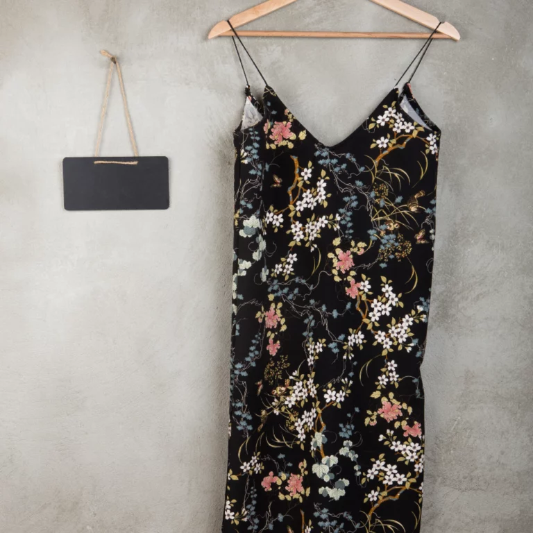 fashion-shopping-concept-blank-blackboard-beautiful-little-black-dress-hanger