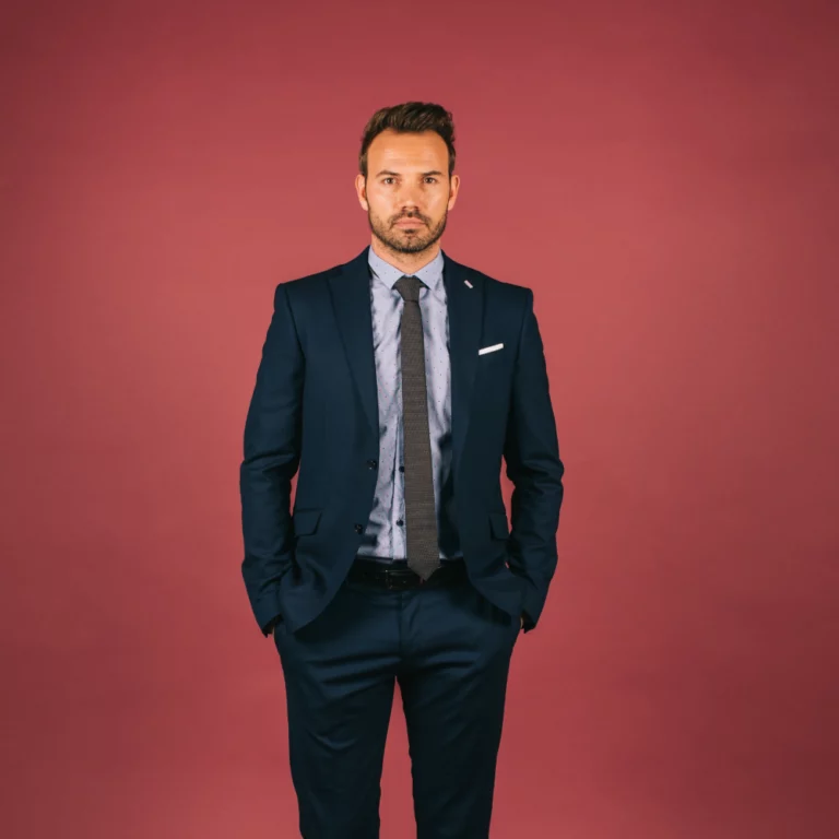 handsome-businessman-looking-camera