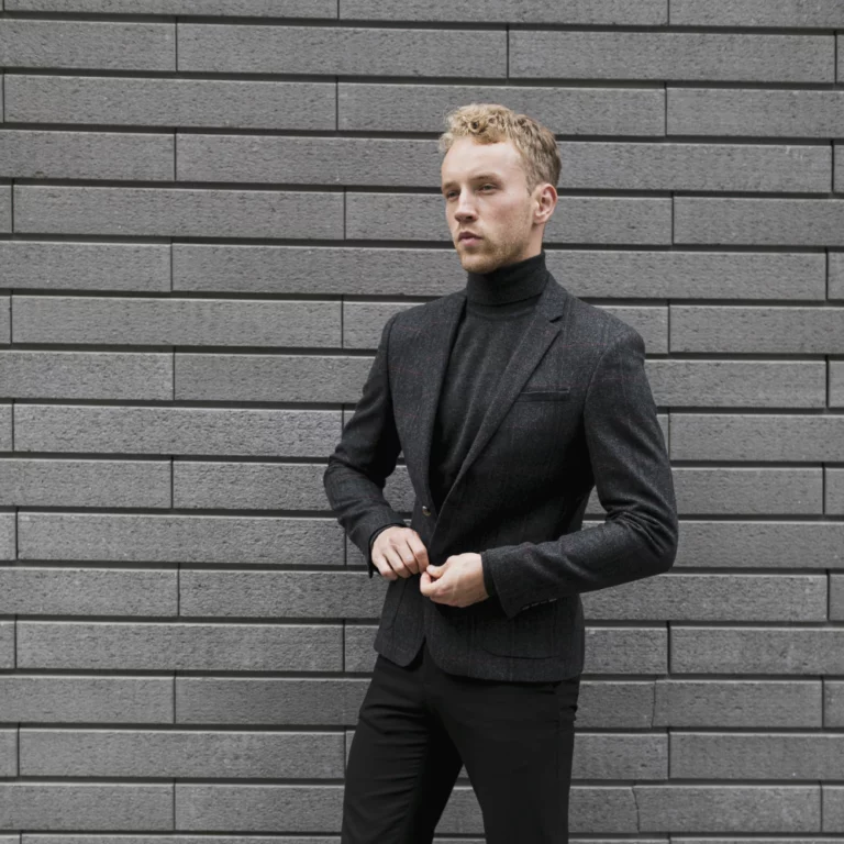 young-man-street-closing-his-jacket
